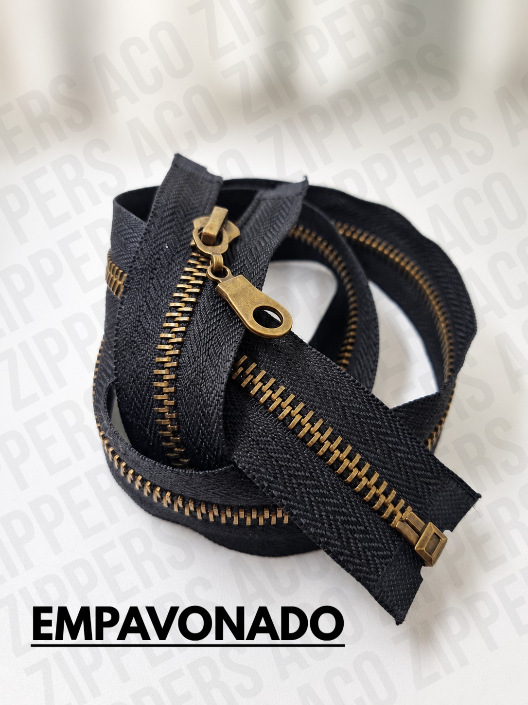 Cierre metálico bronce empavonado enrollado