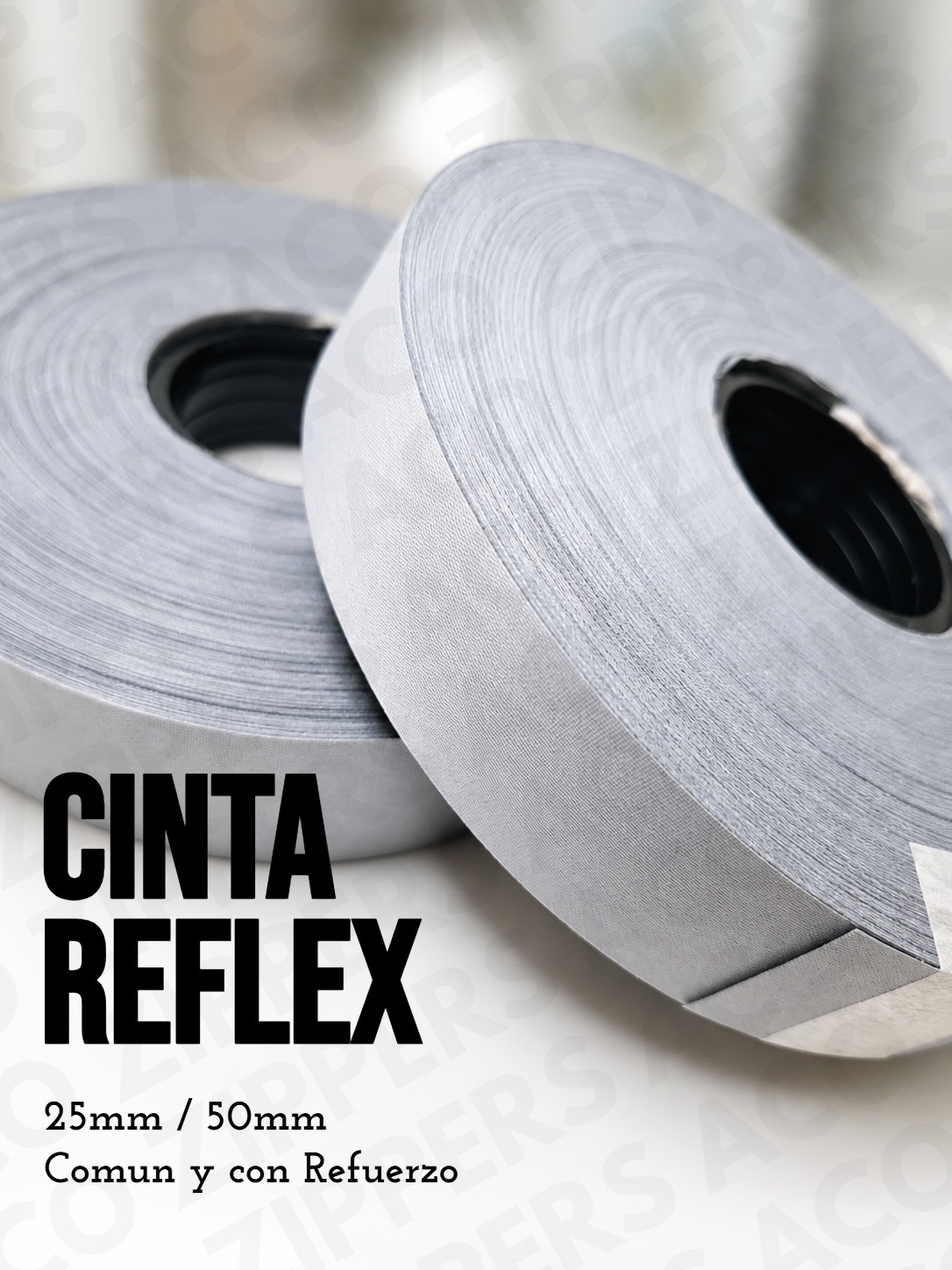 Rollos de cinta reflectiva gris y blanca